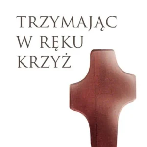 Trzymając w ręku krzyż